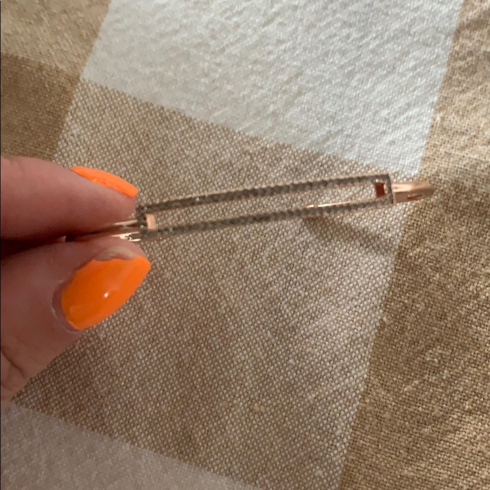 Rose gold colored cuff .. size fits most